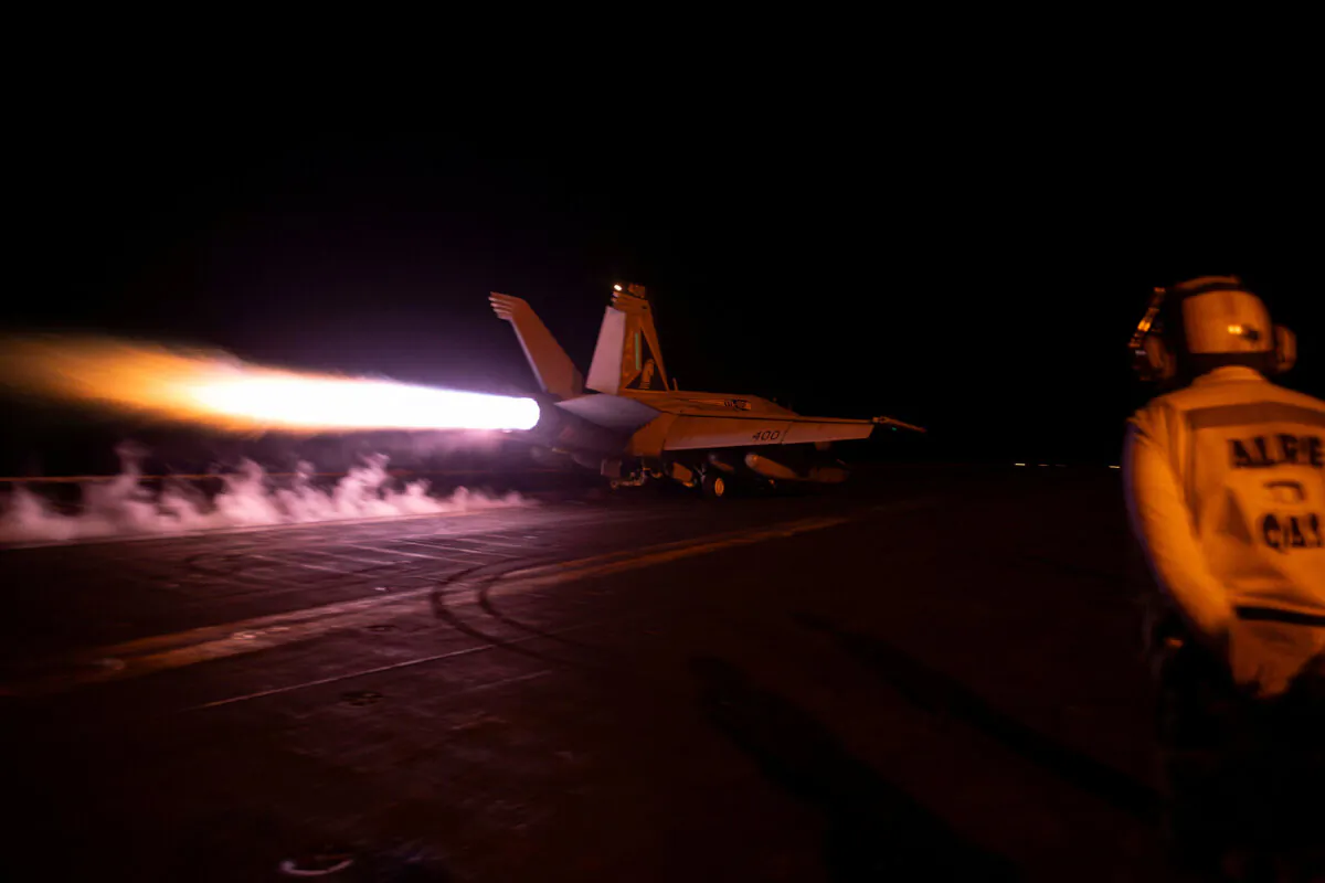 A fighter jet is launched from the U.S. Navy aircraft carrier USS Dwight D. Eisenhower during a strike against what the U.S. military describe as Houthis targets in Yemen, on Feb. 3, 2024. (U.S. Navy/Mass Communication Specialist 3rd Class Janae Chambers/Handout via Reuters)