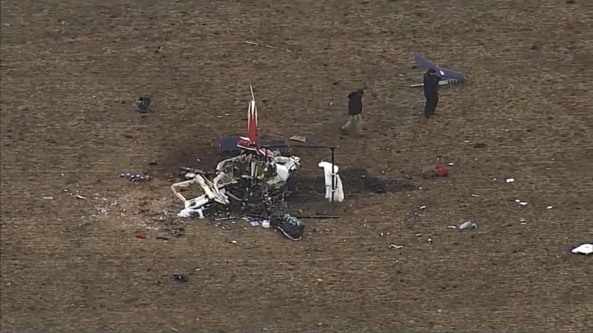 The scene of a helicopter crash in western Okla. on Jan. 20, 2024. (KOCO-5 via AP)