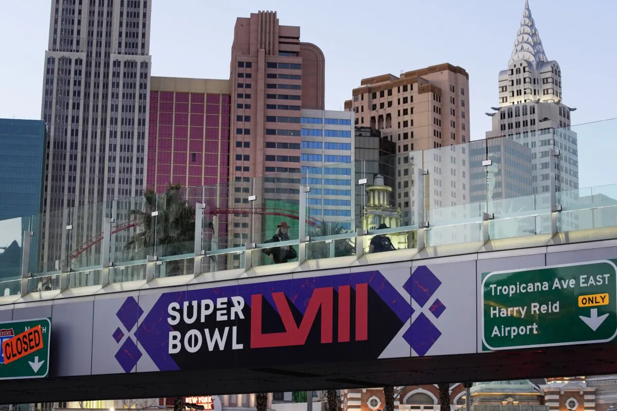 A sign for Super Bowl 58 adorns a pedestrian walkway across the Las Vegas Strip ahead of the Super Bowl in Las Vegas on Jan. 30, 2024. (John Locher/AP Photo)