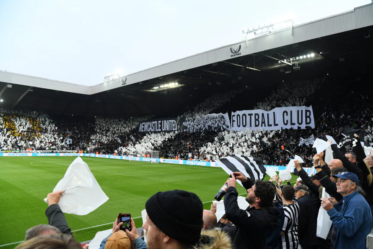 Fans of Newcastle United display a tifo in the stands prior to the Premier League match between Newcastle United and Arsenal at St. James Park in Newcastle upon Tyne, England, on May 16, 2022. (Stu Forster/Getty Images)