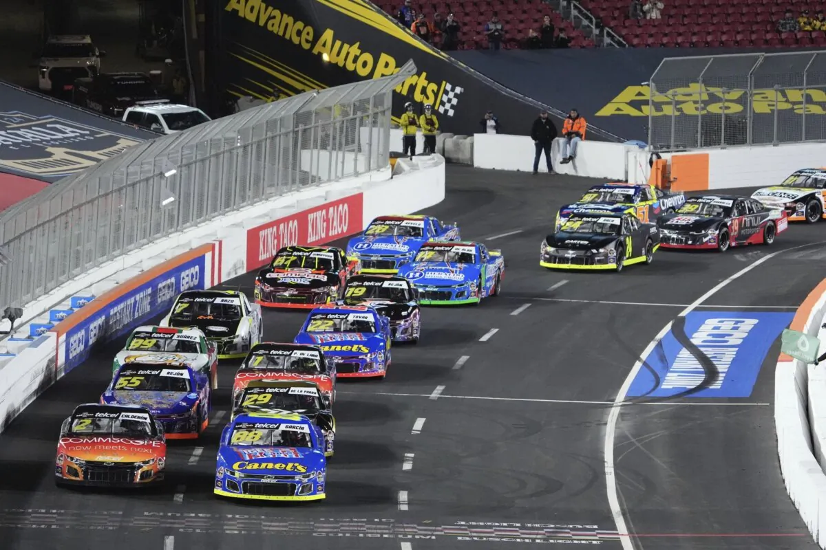 Cars race drives during the NASCAR Mexico Series auto race at Los Angeles Memorial Coliseum in Los Angeles on Feb. 3, 2024. (Mark J. Terrill/AP Photo)