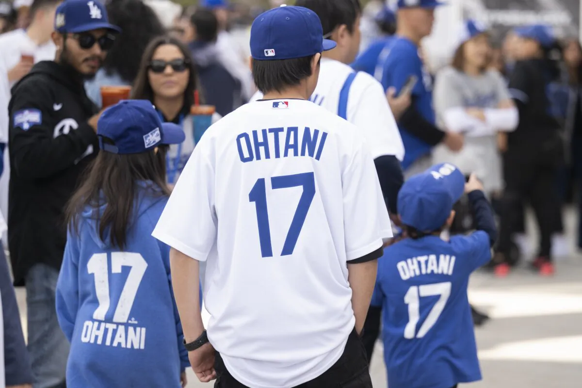Los Angeles Dodgers fans with Shohei Ohtani merchandise attend the team's fan fest in Los Angeles on Feb. 3, 2024. (Kyusung Gong/AP Photo)