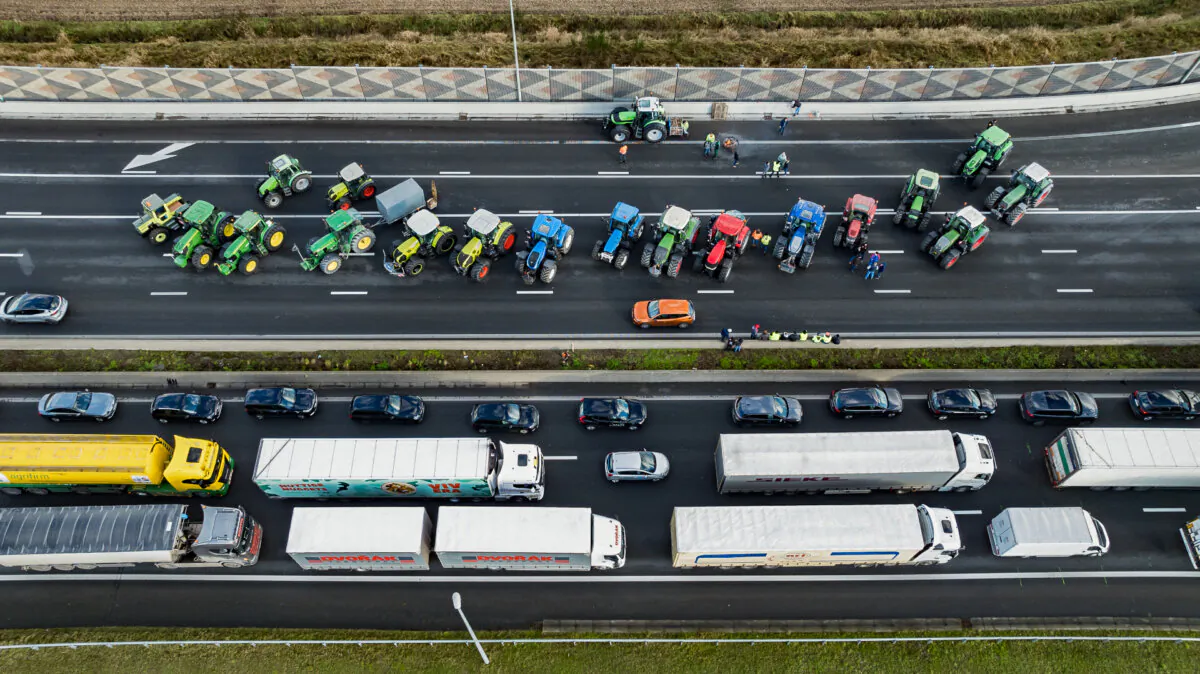 A aerial view shows trucks and tractors blocking the E40 highway during a farmer's protest, in Aalter, Belgium on January 31, 2024. (Kurt Desplenter/AFP via Getty Images)