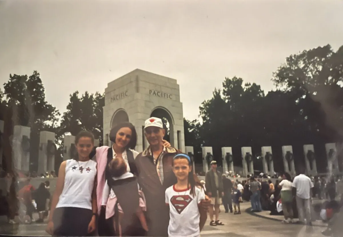 From R: Anna Barren and her grandfather, Joseph Backfield along with her mother and sisters at a memorial site. (Courtesy of Anna Barren)