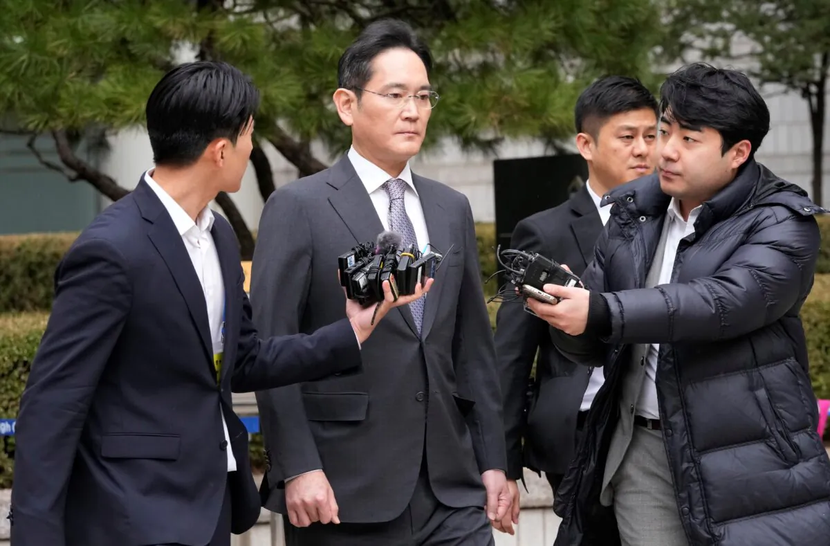 Samsung Electronics Chairman Lee Jae-yong (2nd L), leaves the Seoul Central District Court in Seoul, South Korea, on Feb. 5, 2024. (Ahn Young-joon/AP Photo)