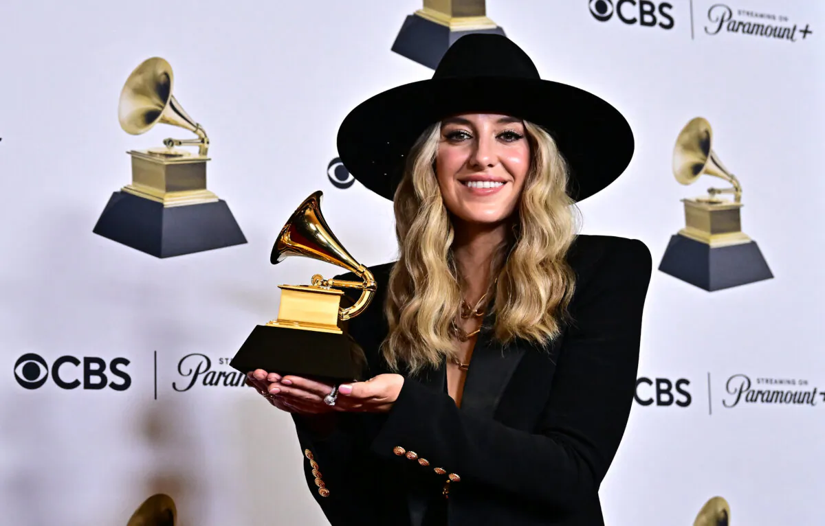 U.S. singer-songwriter Lainey Wilson poses in the press room with the Grammy for Best Country Album for "Bell Bottom Country" during the 66th Annual Grammy Awards at the Crypto.com Arena in Los Angeles on Feb. 4, 2024. (Photo by FREDERIC J. BROWN/AFP via Getty Images)