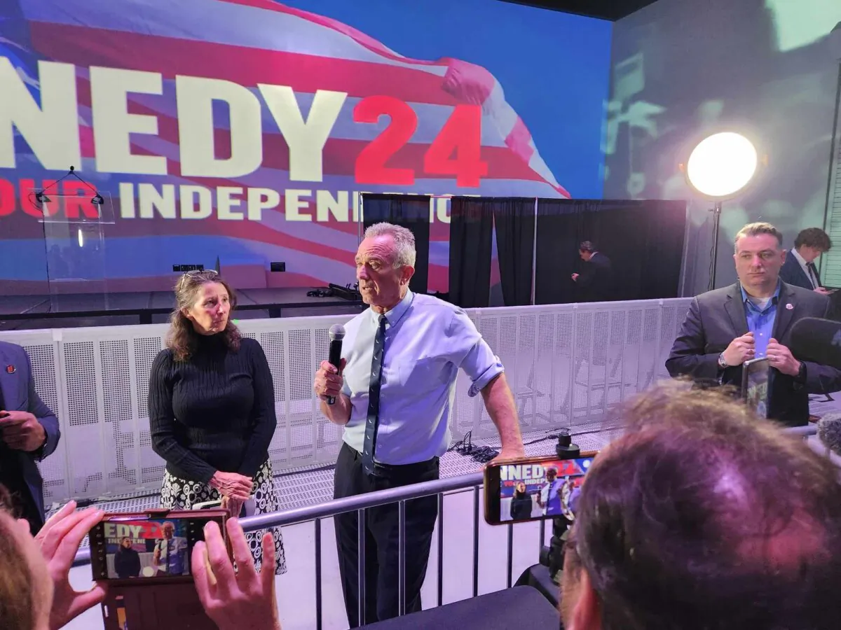 Robert F. Kennedy Jr. talks to reporters after a voter rally in Las Vegas on Feb. 4, 2024. (Jeff Louderback/Epoch Times)