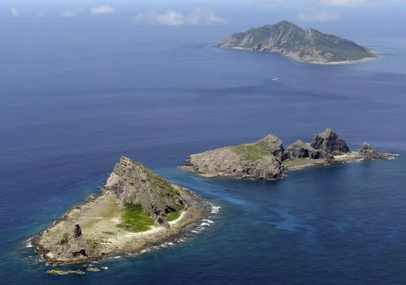 A group of disputed islands, Uotsuri island (top), Minamikojima (bottom) and Kitakojima, known as Senkaku in Japan and Diaoyu in China, in the East China Sea, in September 2012. (Kyodo/Reuters)