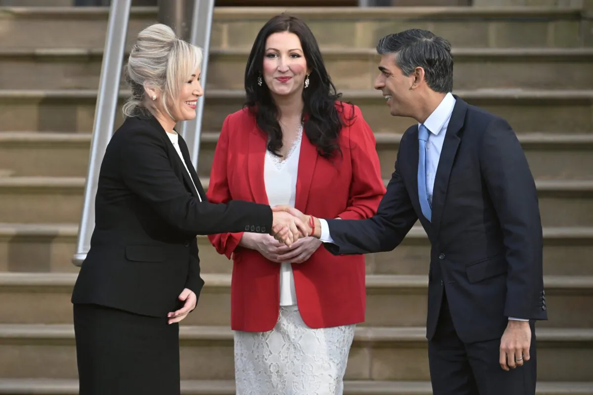 First Minister Michelle O'Neill and Deputy First Minister Emma Little-Pengelly greet Prime Minister Rishi Sunak as he arrives at Stormont Castle in Belfast, Northern Ireland, on Feb. 5, 2024. (Charles McQuillan/Getty Images)