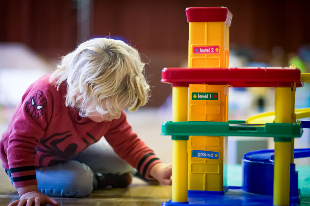 A young boy plays with toys at a pre-school in this file photo. (Matt Cardy/Getty Images)