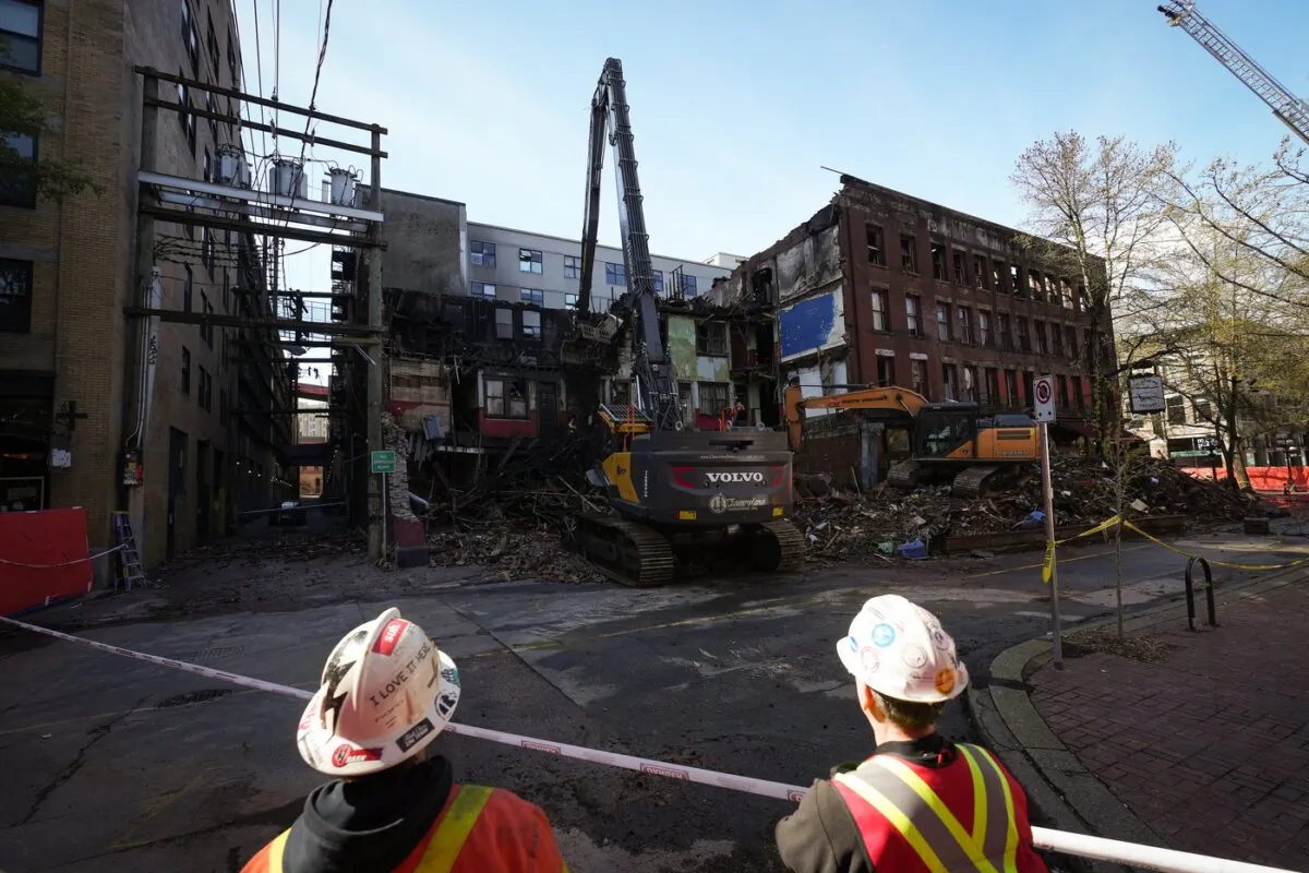Demolition takes place at the Winters Hotel in Vancouver, B.C., on April 22, 2022. (The Canadian Press/Darryl Dyck)