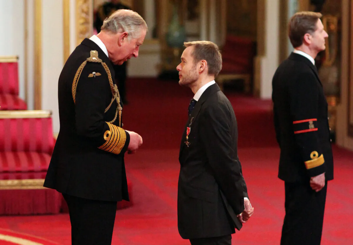 Professor John Edmunds is made an Officer of the Order of the British Empire by the Prince of Wales during an Investiture ceremony, at Buckingham Palace, London, in 2016. (PA)