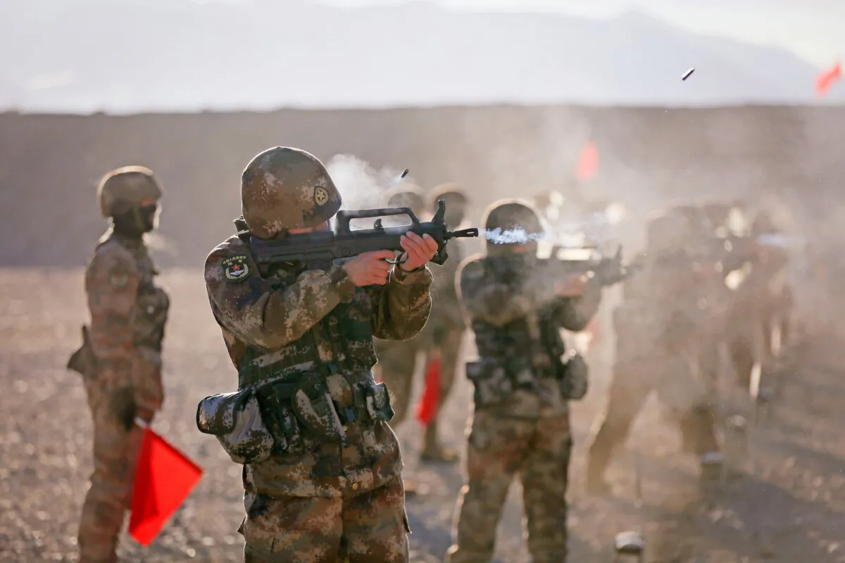 Chinese People's Liberation Army (PLA) soldiers take part in military training at Pamir Mountains in Kashgar, Xinjiang Autonomous Region, China, on Jan. 4, 2021. (STR/AFP via Getty Images)