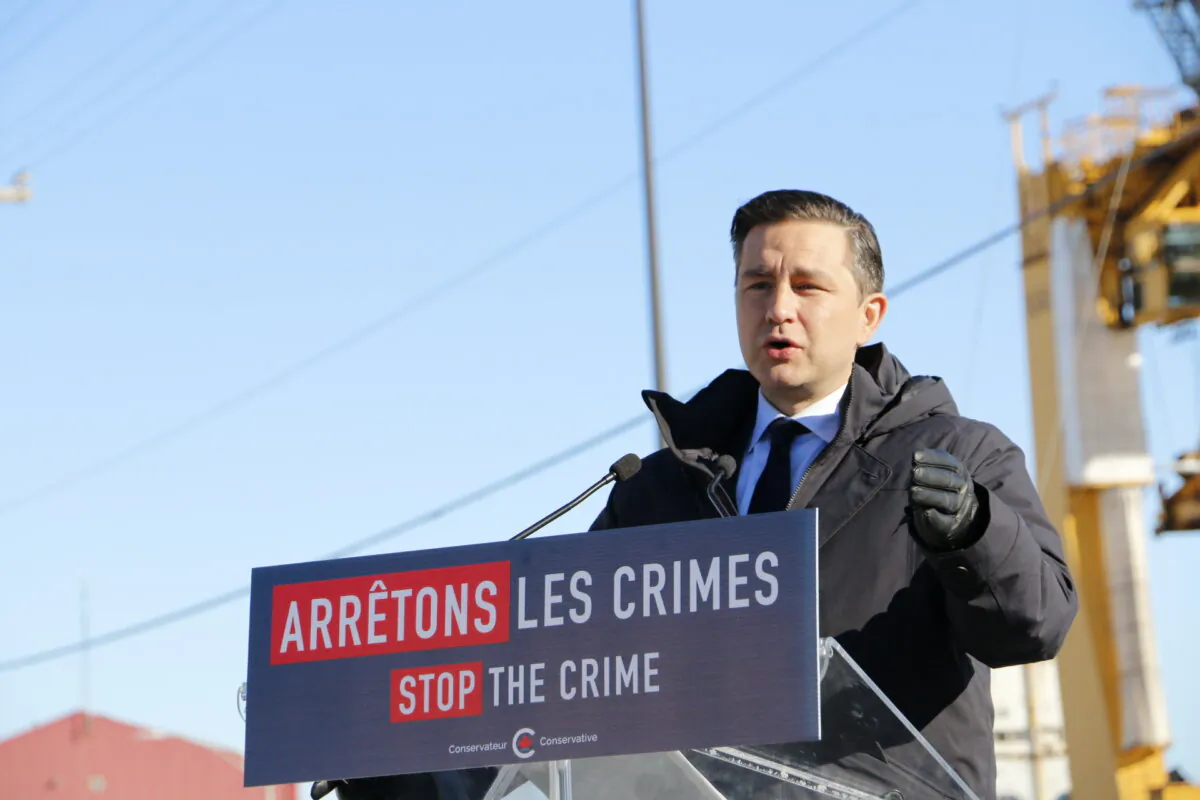 Conservative Party Leader Pierre Poilievre speaks to reporters next to the Port of Montreal on Feb. 6, 2024. (Noé Chartier/The Epoch Times)