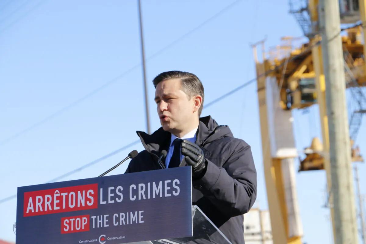 Conservative Leader Pierre Poilievre speaks to reporters next to the Port of Montreal on Feb. 6, 2024. (Noé Chartier/The Epoch Times)