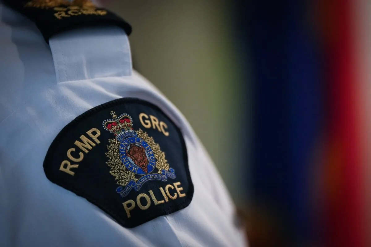 An RCMP patch is seen on a shoulder in Surrey, B.C., on April 28, 2023. (The Canadian Press/Darryl Dyck)