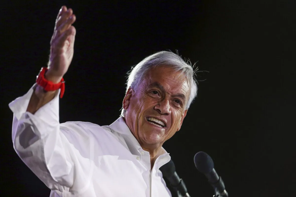Sebastian Pinera, former Chilean president who is running again for office, addresses supporters at his closing campaign rally in Santiago, Chile, on Nov. 16, 2017. (Luis Hidalgo/AP Photo)