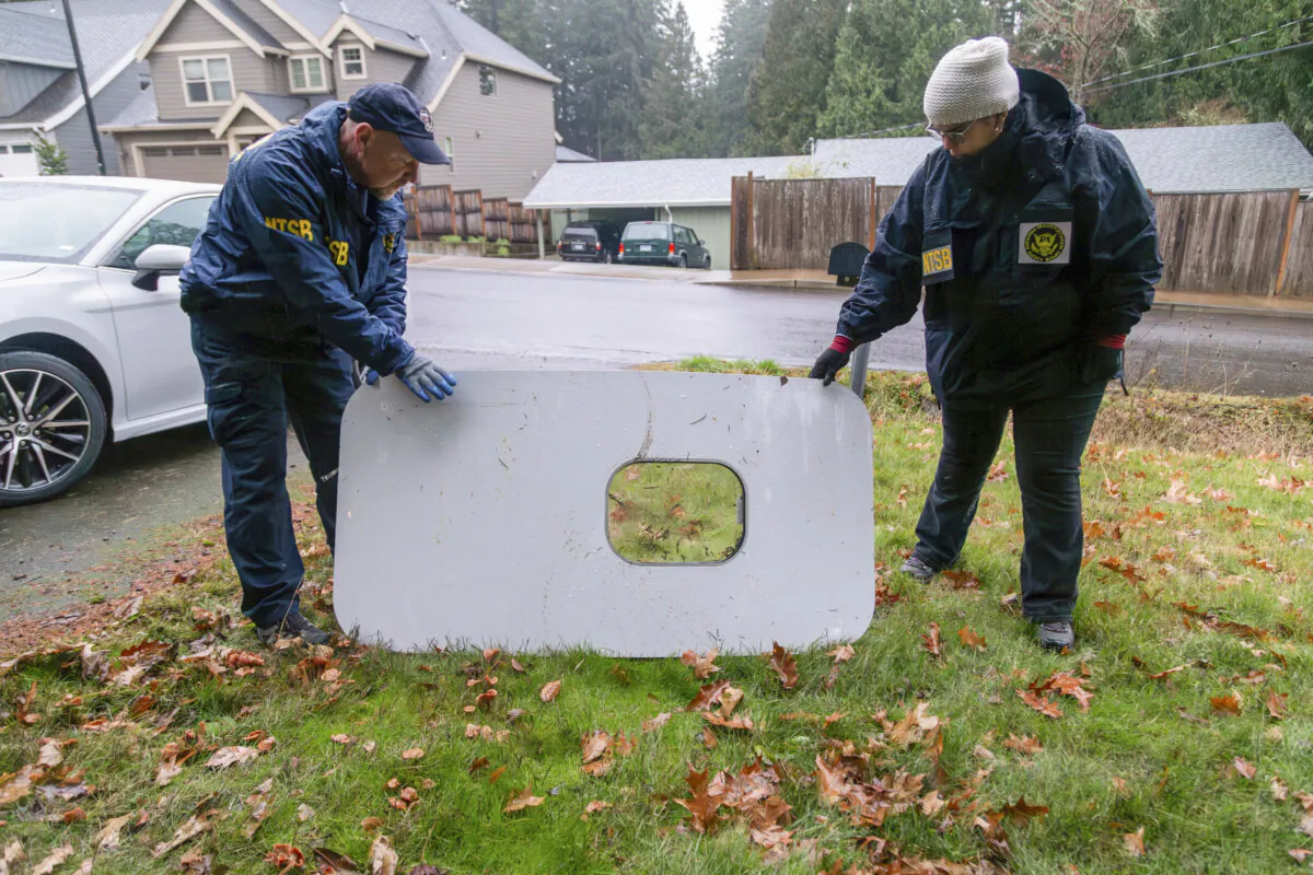 This photo released by the National Transportation Safety Board shows the door plug from Alaska Airlines Flight 1282 on Monday, Jan. 8, 2024, in Portland, Ore. A panel used to plug an area reserved for an exit door on the Boeing 737 Max 9 jetliner blew out Jan. 5, shortly after the flight took off from Portland, forcing the plane to return to Portland International Airport. (National Transportation Safety Board via AP)