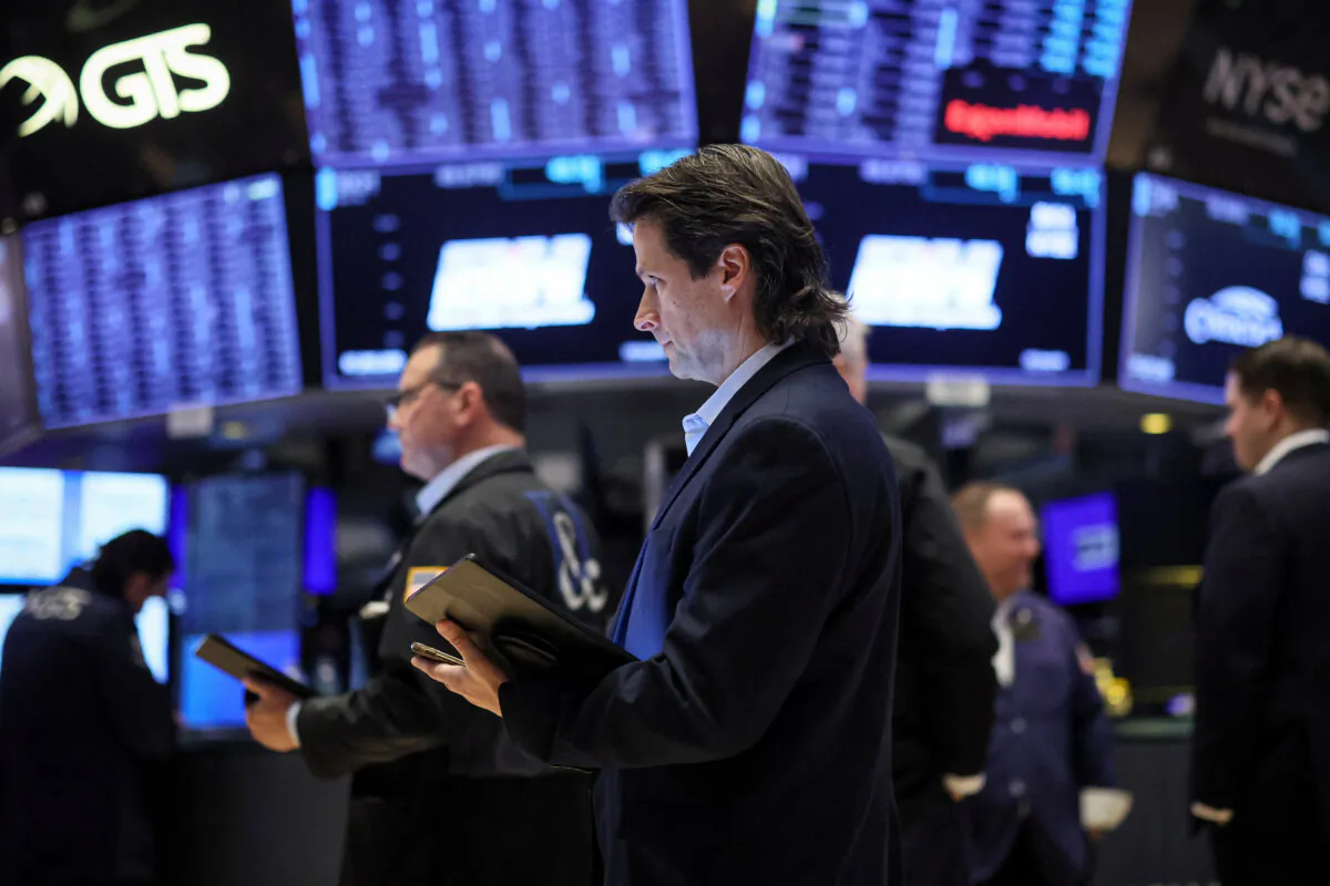 Traders work on the floor at the New York Stock Exchange (NYSE) in New York City, on Feb. 6, 2024. (Brendan McDermid/Reuters)