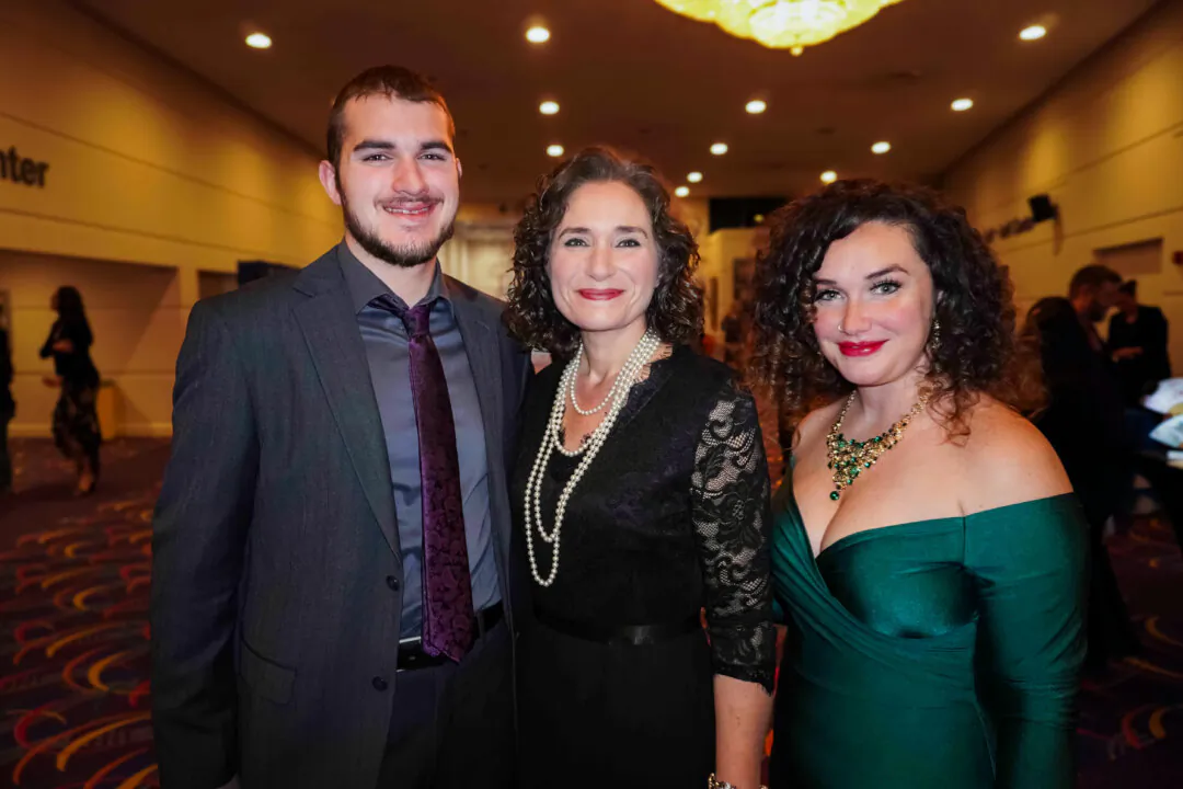 Mende Staggs (C) with her son, Corin Staggs, and her daughter, Clarissa Whitehouse, enjoyed Shen Yun's evening performance at the ArcBest Corporation Performing Arts Center on Feb. 6, 2024. (Sonia Wu/The Epoch Times)