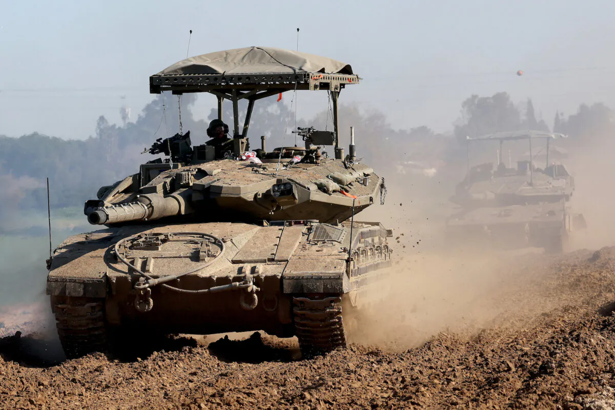 Israel's Merkava tanks roll in southern Israel along the border with the Gaza Strip on Feb. 7, 2024.(Jack Guez/ AFP)