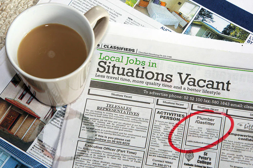 In this photo illustration job vacancies are displayed in the newspaper in Auckland, New Zealand, on Aug. 7, 2009. (Sandra Mu/Getty Images)