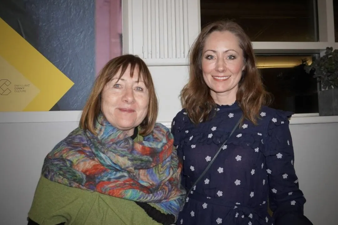 Nonna Drinnan with her daughter Kyra Cullinan at the Shen Yun Performing Arts performance at Venue Cymru, in the U.K., on Jan. 7, 2024. (Mary Mann/The Epoch Times)