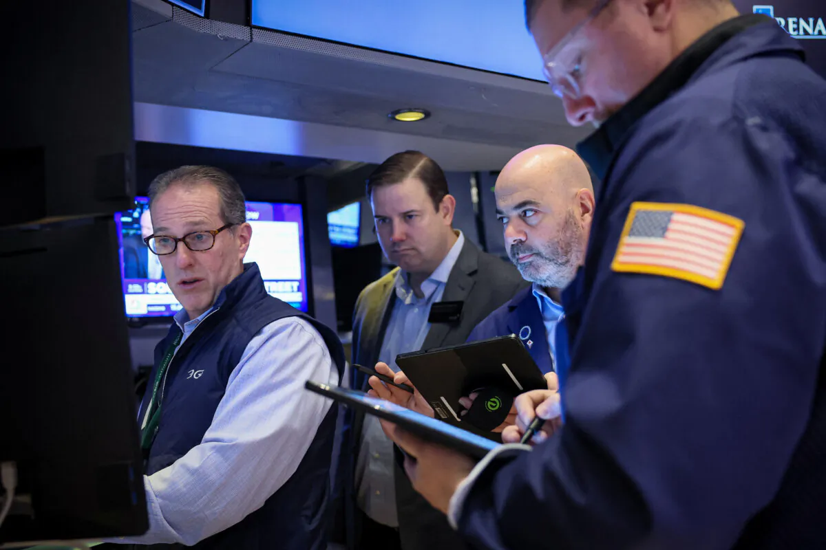 Traders work on the floor at the New York Stock Exchange (NYSE) in New York City on Feb. 7, 2024. (Brendan McDermid/Reuters)