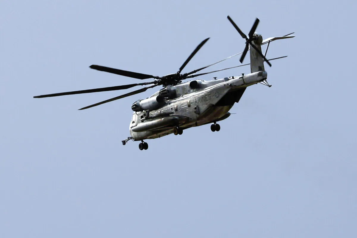 A Marine CH-53E Super Stallion helicopter flies during training at Marine Corps Air Station Miramar in San Diego on Feb. 6, 2024. (K.C. Alfred/The San Diego Union-Tribune via AP)