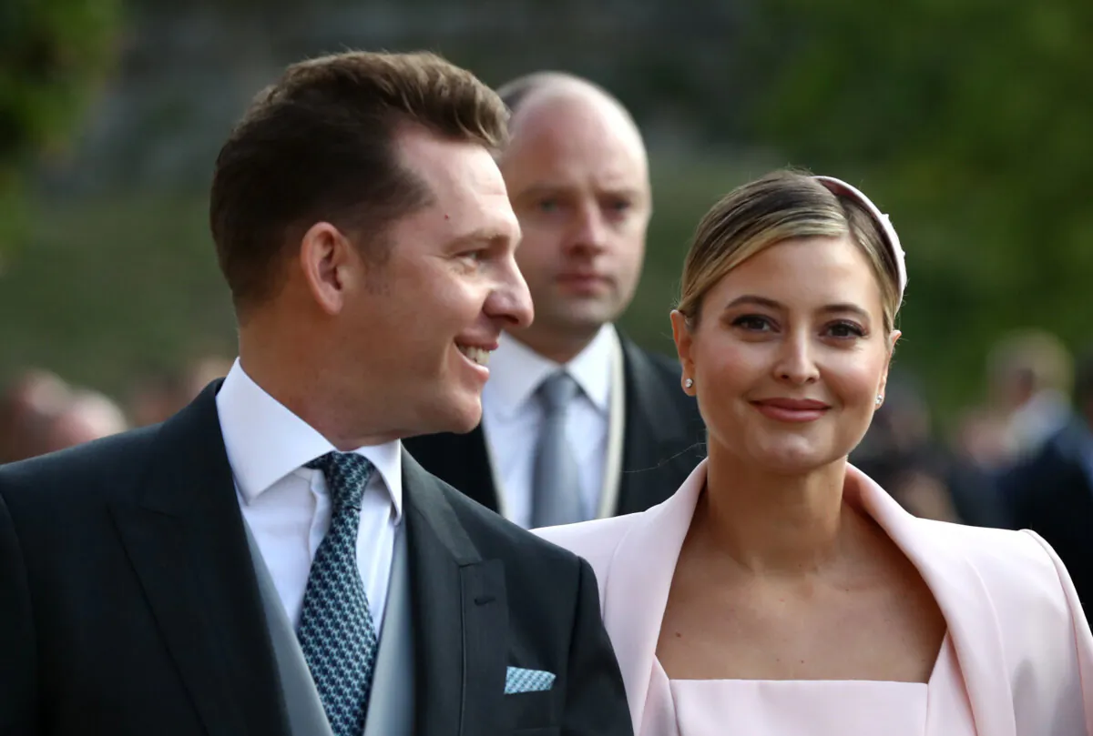 Nick Candy and Holly Candy arrive ahead of the wedding of Princess Eugenie of York to Jack Brooksbank at Windsor Castle in Windsor, England on Oct. 12, 2018. (Gareth Fuller - WPA Pool/Getty Images)