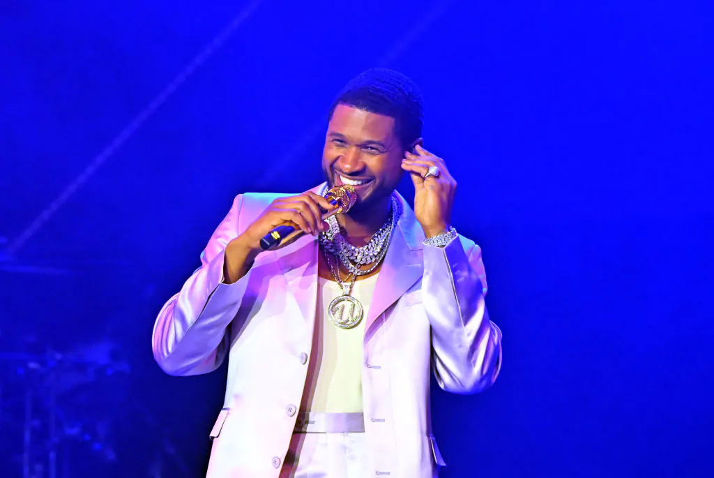Usher performs during the Strength Of A Woman Festival & Summit State Farm Arena Concert at State Farm Arena in Atlanta on May 7, 2022. (Derek White/Getty Images)