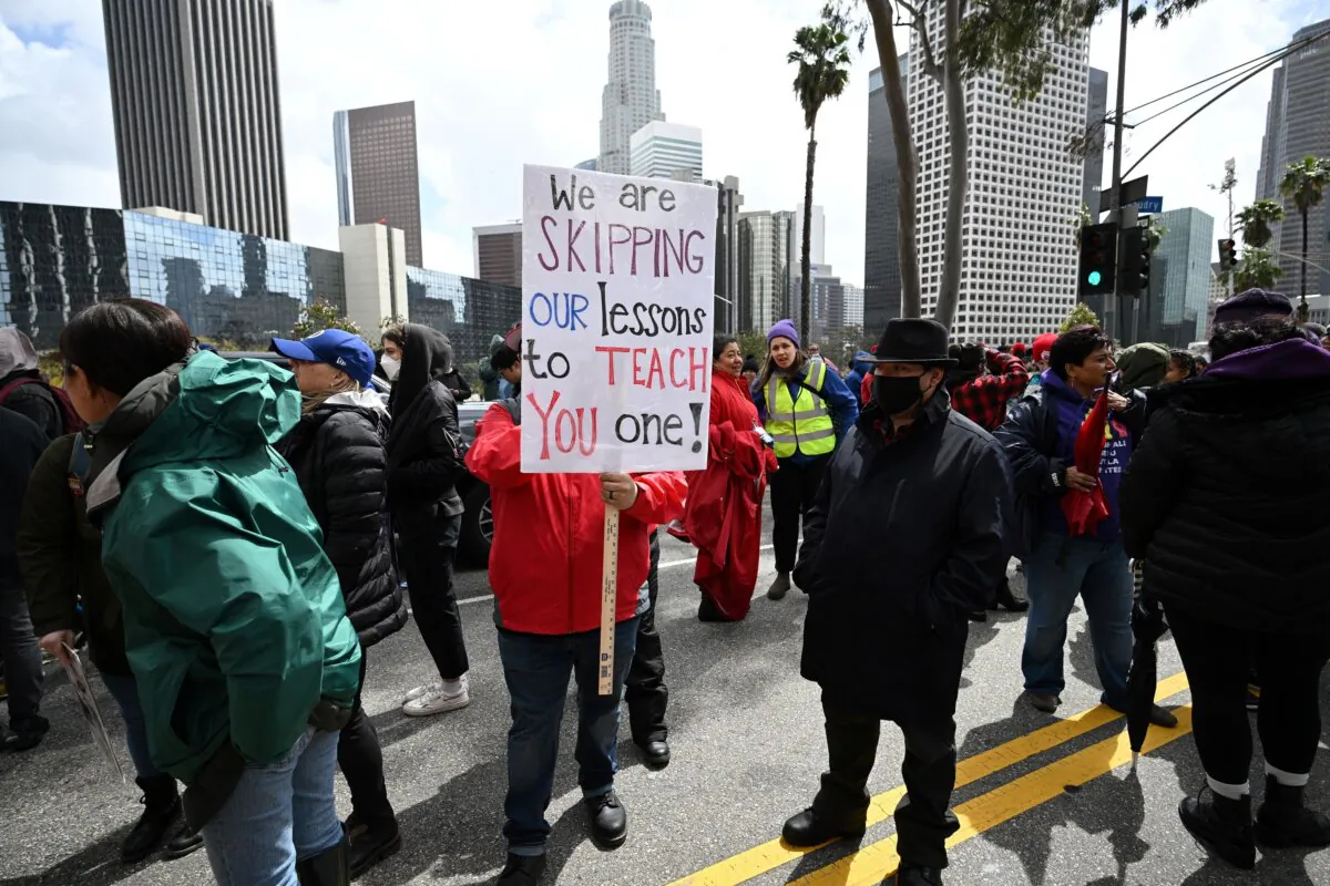 Los Angeles public school support staff, teachers, and supporters rally outside of the school district headquarters on the first day of a three-day strike in Los Angeles on March 21, 2023. (Robyn Beck/AFP via Getty Images)