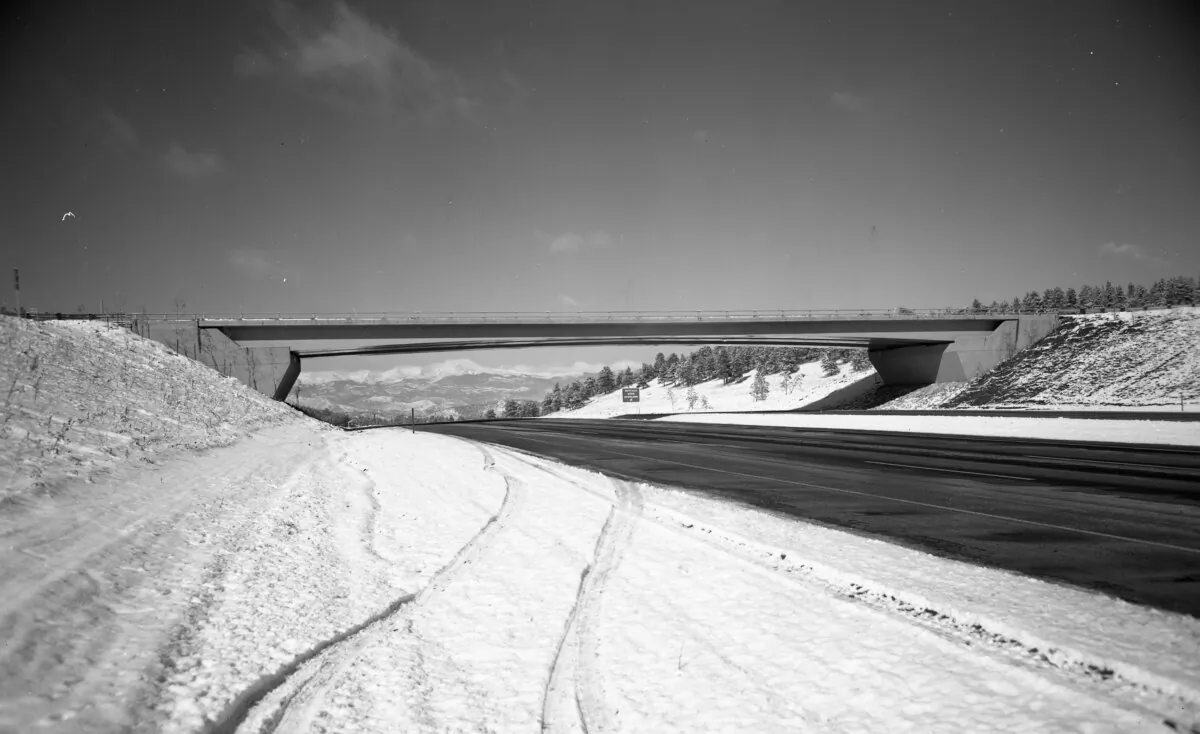 This photo was taken around 1970 or 1971, shortly after the Genesee Bridge, sometimes known as the Picture Frame Bridge, was built along U.S. Route 40 over Interstate 70 near Genesee, Colorado. The bridge frames the Rocky Mountains as you drive westbound from Denver. (Provided by the Colorado Department of Transportation/TNS)