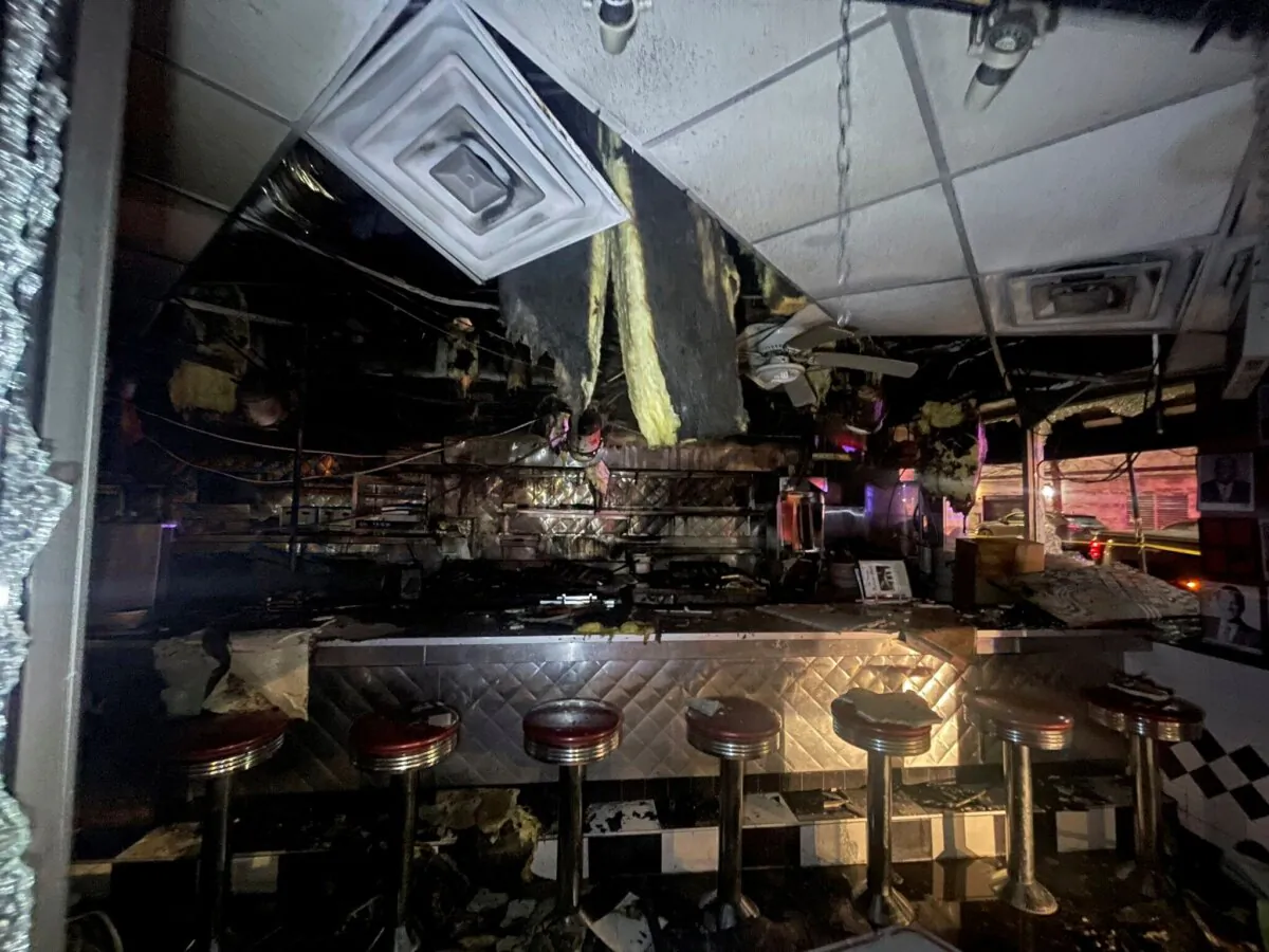 Damage can be seen to the Palace Grill after an overnight fire in Chicago early on Feb. 9, 2024. (Chicago Fire Dept. via AP)