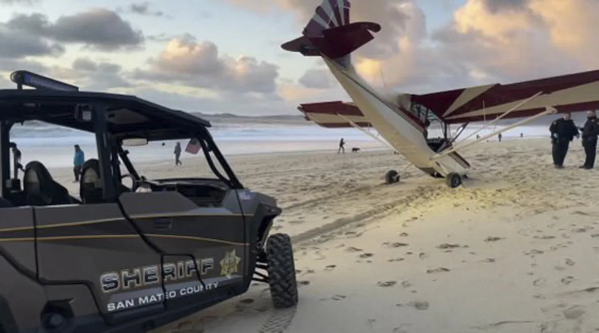 In this photo provided by the San Mateo County Sheriff's Office, is a stolen plane that crashed on the beach in Half Moon Bay, Calif., on Feb. 8, 2024. (San Mateo County Sheriff's Office via AP)