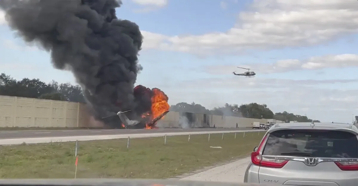 Smoke and fire fills the air after an airplane crashed on Interstate 75, near Naples, Fla., on Feb. 10, 2024. (Chris O'Conner via AP)