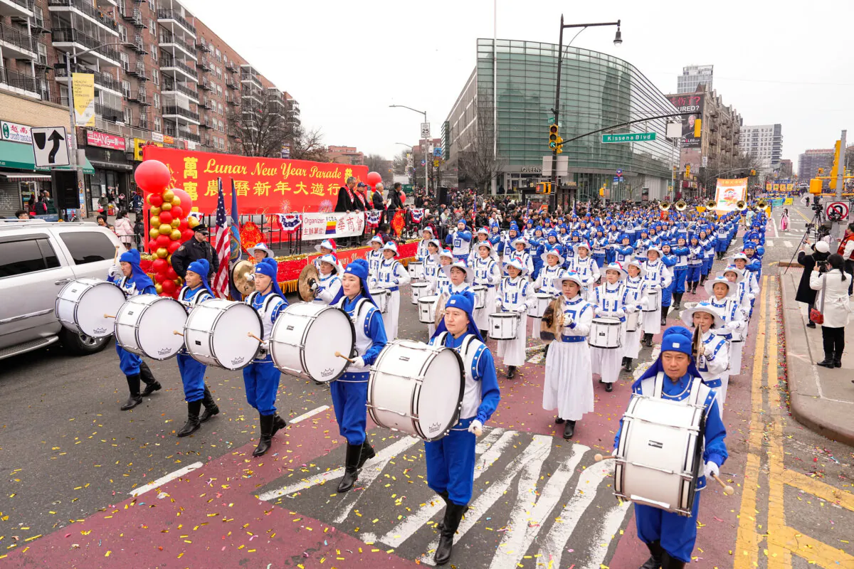 The Tian Guo Marching Band at the Chinese New Year parade in the Flushing neighborhood of Queens, N.Y., on Feb. 10, 2024. (Larry Dye/The Epoch Times)