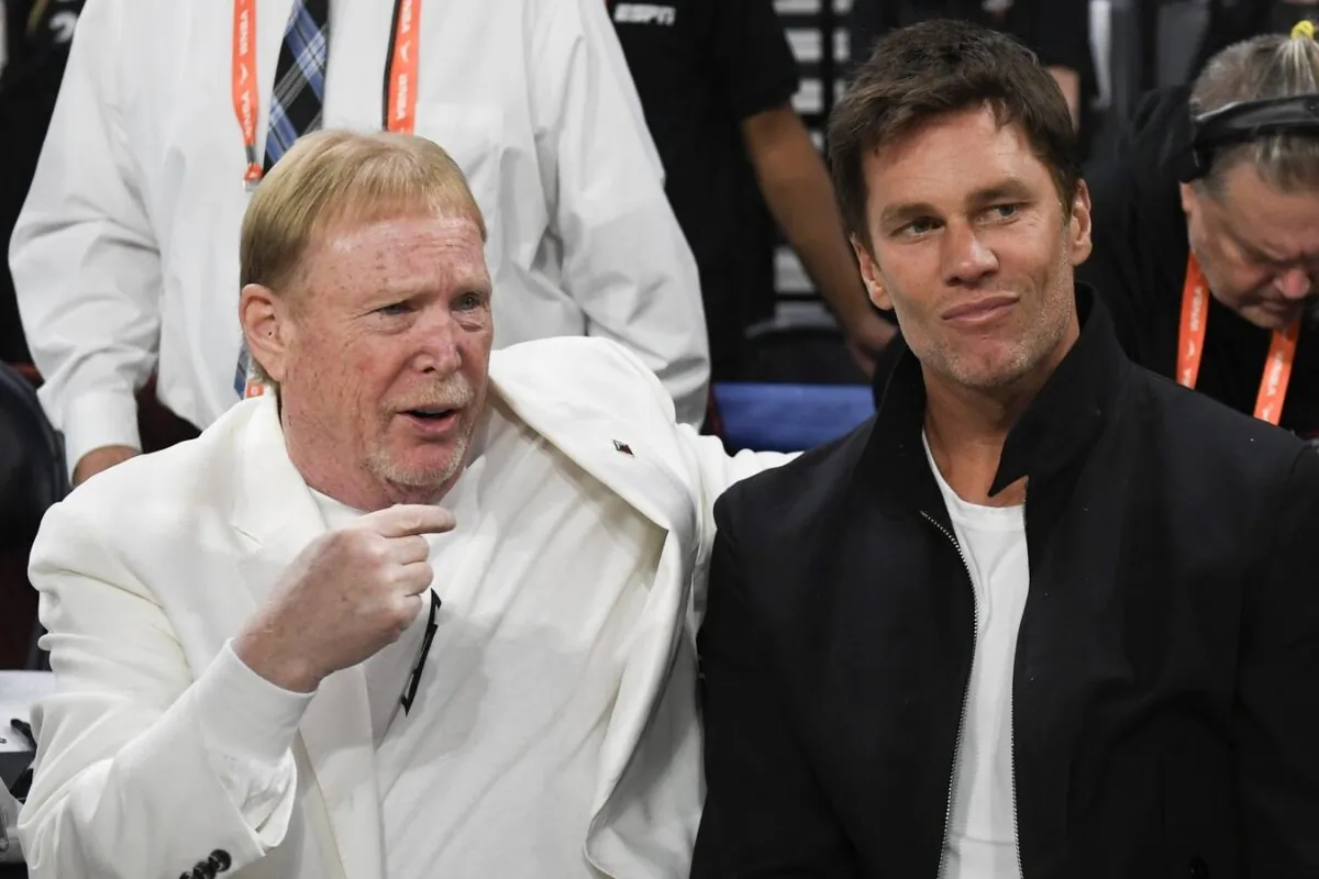 Las Vegas Raiders owner Mark Davis and part-owner Tom Brady talk before the game between the Las Vegas Aces and the New York Liberty during game one of the 2023 WNBA Finals in Las Vegas on Oct. 8, 2023. (Candice Ward/USA TODAY Sports via Field Level Media)
