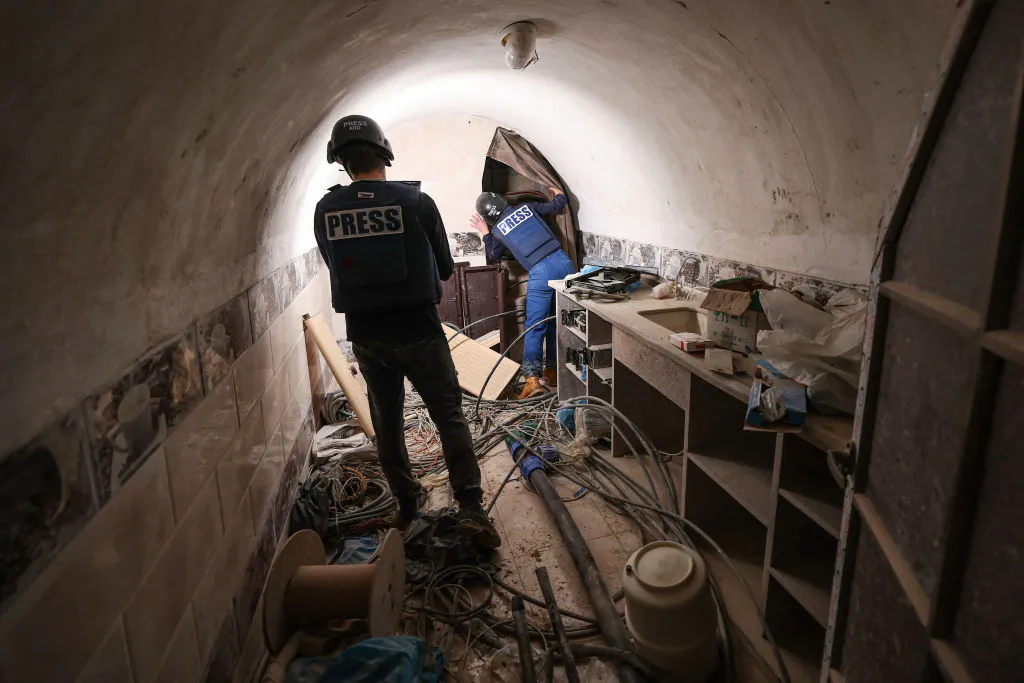 The Israeli military shows journalists a tunnel that the army claimed is a “Hamas command tunnel” under a compound of the U.N. Relief and Works Agency for Palestine Refugees (UNRWA) in Gaza City, on on Feb. 8, 2024, amid the continuing war between Israel and the Palestinian militant group. (Jack Guez/AFP via Getty Images)