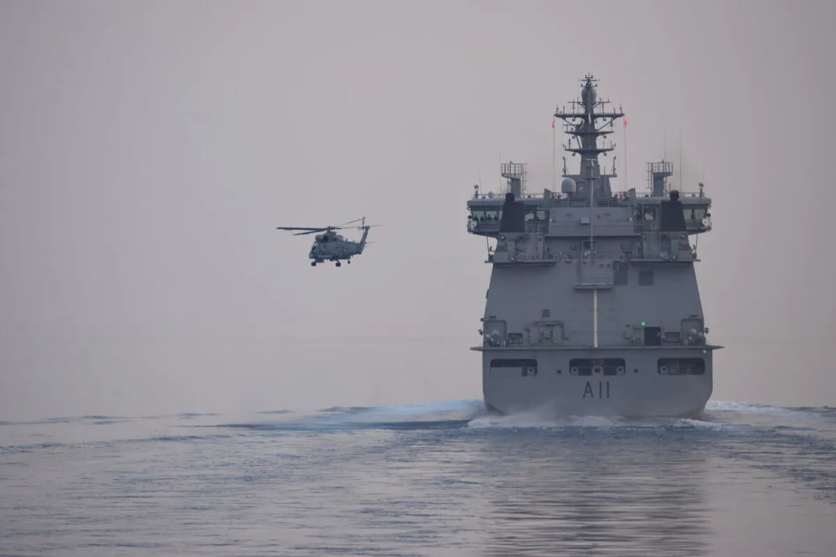 A Seasprite Helicopter flies alongside HMNZS Aotearoa. New Zealand's fleet of naval helicopters have reached the end of their life and need replacing at a cost of $1 billion. (Supplied courtesy NZDF)