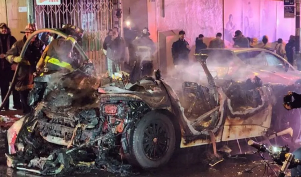A Waymo rider-only robotaxi was surrounded by a mob and destroyed during Lunar New Year celebrations in the Chinatown neighborhood of San Francisco on Feb. 10, 2024. (Courtesy of Séraphine Hossenlopp)