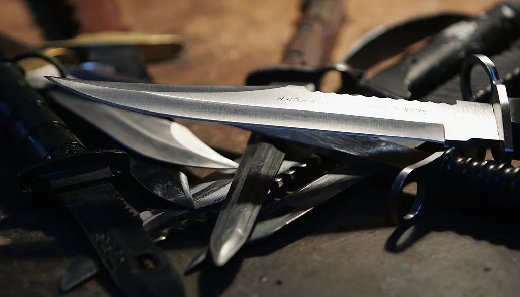 Hunting knifes are displayed at a film and television prop company in London, England, on Dec. 13, 2004. (Ian Waldie/Getty Images)