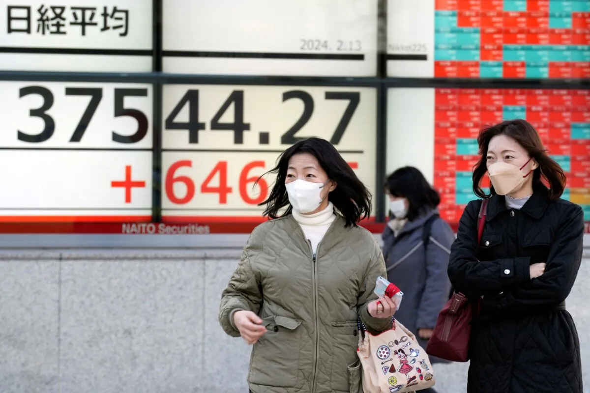 An electronic stock board shows Japan's Nikkei 225 index at a securities firm in Tokyo on Feb. 13, 2024. (Eugene Hoshiko/AP Photo)