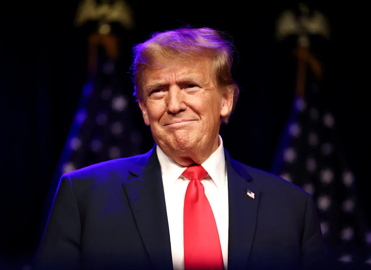 Republican presidential candidate and former President Donald Trump greets supporters during his caucus night watch party at the Treasure Island Hotel & Casino in Las Vegas on Feb. 8, 2024. (Mario Tama/Getty Images)