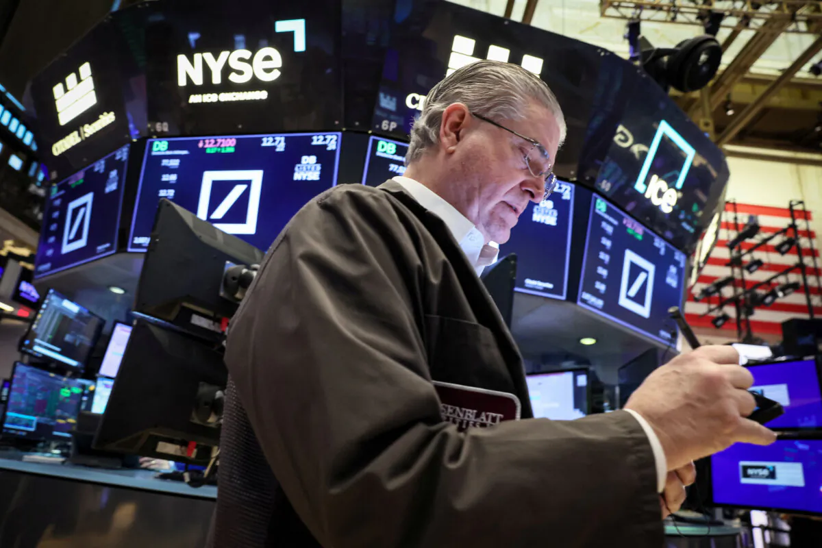Traders work on the floor at the New York Stock Exchange (NYSE) in New York City on Feb. 12, 2024. (Brendan McDermid/Reuters)