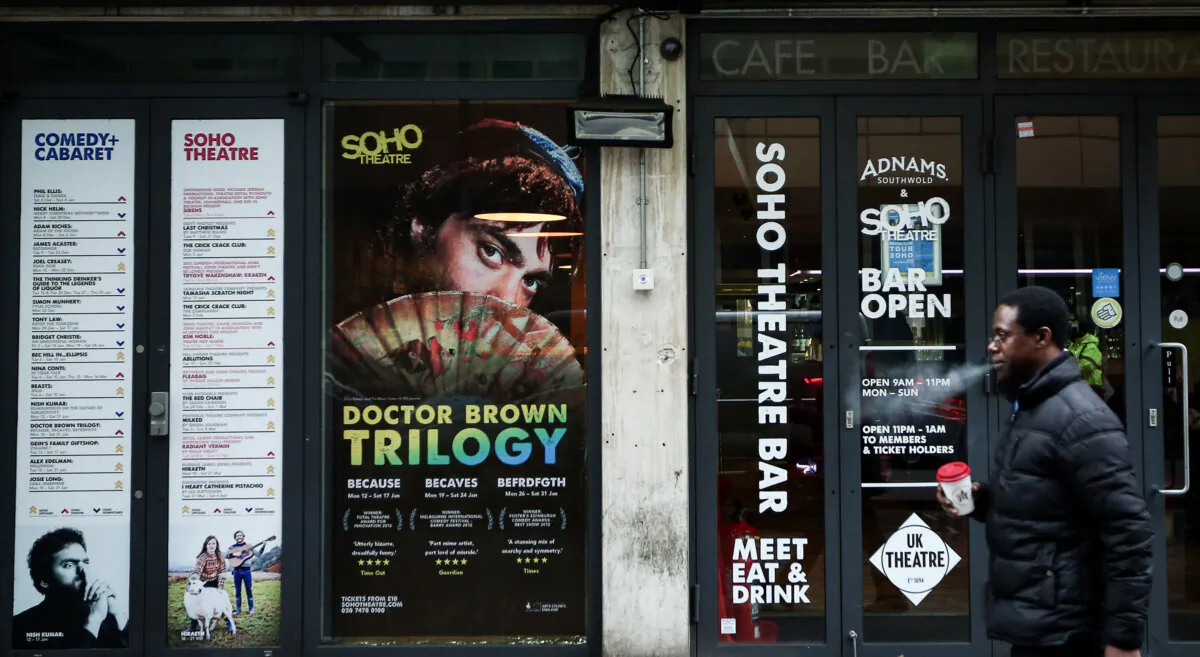 A man walks past Soho Theatre in London, on Jan. 21, 2015. (Carl Court/Getty Images)