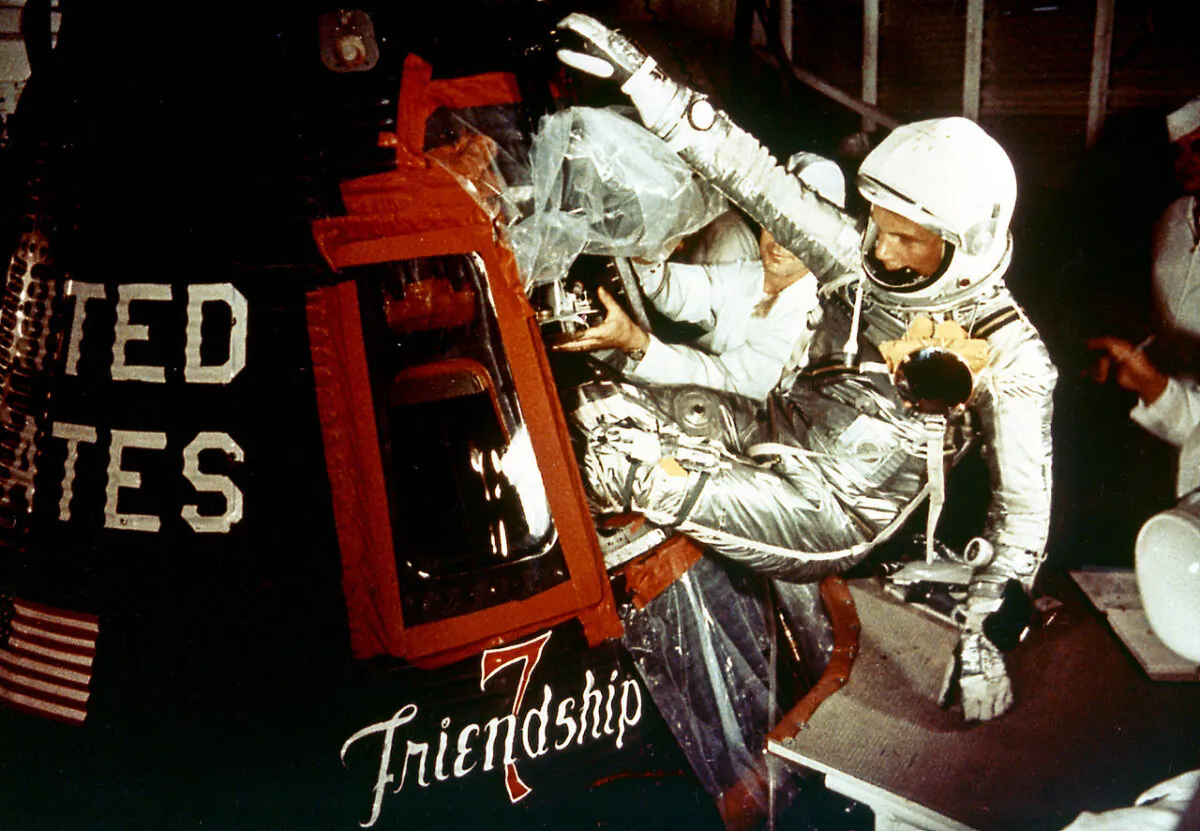 John Glenn entering his spacecraft, Friendship 7, prior to the launch of Mercury-Atlas 6 on Feb. 20, 1962. (Public Domain)