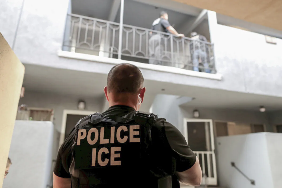 A U.S. Immigration and Customs Enforcement agent in Hawthorne, Calif., on March 1, 2020. (Lucy Nicholson/Reuters)