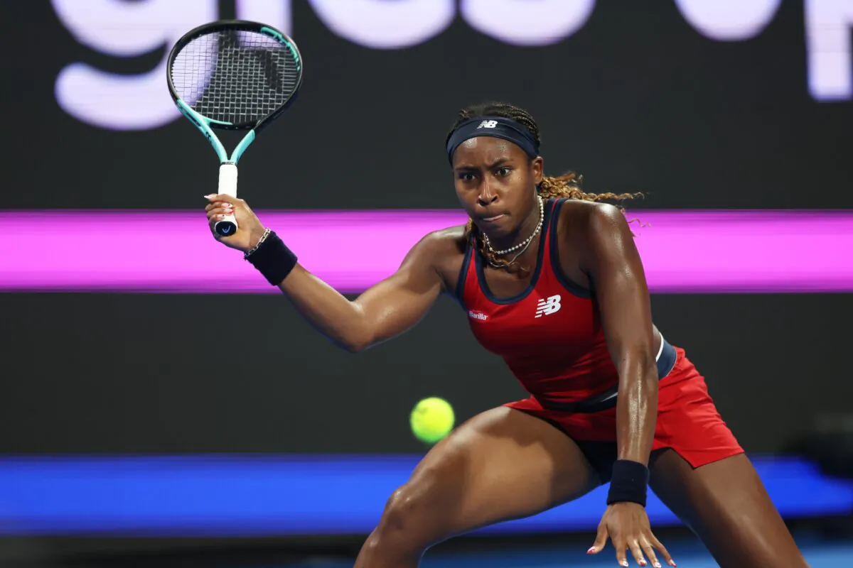 Coco Gauff of the United States plays a forehand against Katerina Siniakova of the Czech Republic in their women's singles 2nd round match during the Qatar TotalEnergies Open, part of the Hologic WTA Tour at Khalifa International Tennis and Squash Complex in Doha, Qatar, on Feb. 13, 2024. (Clive Brunskill/Getty Images)