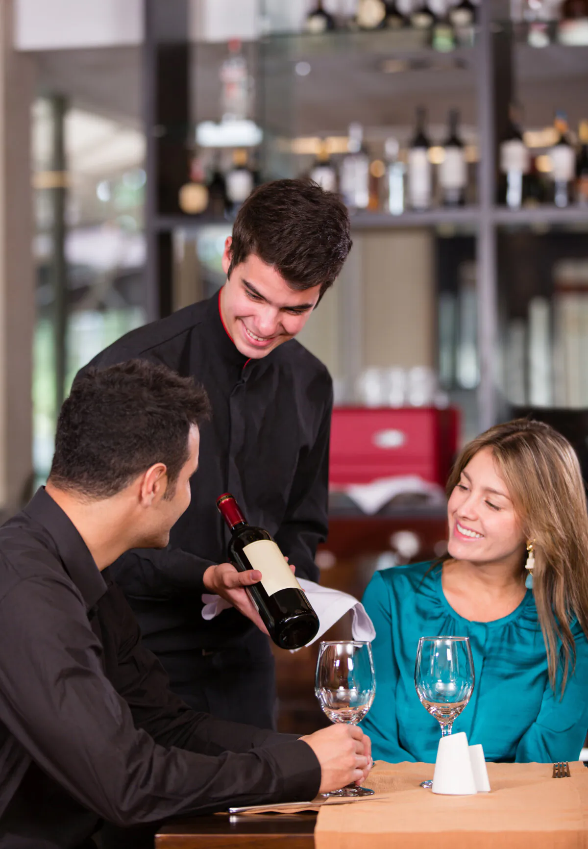 When in a restaurant and you're unable to decipher the wine list, ask for assistance. (ESB Professional/Shutterstock)